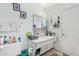 Clean bathroom with vanity, sink, and shower/tub at 6654 N 43Rd Ave, Glendale, AZ 85301