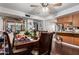 Dining area with wooden table and chairs, kitchen partially visible at 6654 N 43Rd Ave, Glendale, AZ 85301