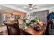 Dining area with wooden table and chairs, adjacent to kitchen at 6654 N 43Rd Ave, Glendale, AZ 85301