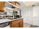Kitchen features a cooktop and built in cabinets at 6654 N 43Rd Ave, Glendale, AZ 85301
