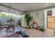 Covered patio with seating area, plants, and tiled floor at 6654 N 43Rd Ave, Glendale, AZ 85301