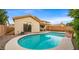 Inviting kidney-shaped pool in a backyard oasis at 6703 W Linda Ln, Chandler, AZ 85226