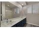 Bathroom with double vanity and shower at 6703 W Linda Ln, Chandler, AZ 85226