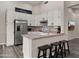 Well-equipped kitchen with white cabinets and pink countertops at 6703 W Linda Ln, Chandler, AZ 85226