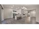 Open floor plan with kitchen and dining area, ideal for entertaining at 6703 W Linda Ln, Chandler, AZ 85226