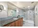 Spa-like bathroom with granite vanity and walk-in shower at 7438 E Hum Rd # 101, Carefree, AZ 85377