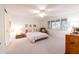Bright bedroom with double bed, carpet flooring, and ample natural light at 7438 E Hum Rd # 101, Carefree, AZ 85377