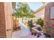 Landscaped courtyard with a walkway and various plants at 7438 E Hum Rd # 101, Carefree, AZ 85377