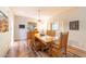 Formal dining room with wood table and hardwood floors at 7438 E Hum Rd # 101, Carefree, AZ 85377