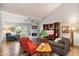 Bright living room featuring a fireplace and built-in shelving at 7438 E Hum Rd # 101, Carefree, AZ 85377