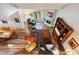 Open living area with hardwood floors, fireplace, and ample seating at 7438 E Hum Rd # 101, Carefree, AZ 85377