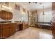 Bathroom featuring granite countertops, a walk-in shower, and soaking tub at 7487 E Visao Dr, Scottsdale, AZ 85266