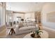 Bright, open-concept living room flowing into kitchen with modern finishes and neutral tones at 7487 E Visao Dr, Scottsdale, AZ 85266