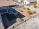 Aerial view showcasing house with backyard, landscaping, and surrounding homes at 802 W Jardin Dr, Casa Grande, AZ 85122