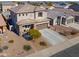 Two-story house with a two-car garage and landscaping at 802 W Jardin Dr, Casa Grande, AZ 85122