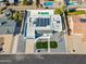 Modern home with pool and solar panels from above at 9626 N 17Th Pl, Phoenix, AZ 85020