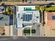 An aerial view showcasing a house, pool, and solar panels at 9626 N 17Th Pl, Phoenix, AZ 85020