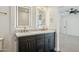 Modern bathroom with double vanity and LED lit mirrors at 9626 N 17Th Pl, Phoenix, AZ 85020