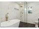 Luxurious bathroom featuring a soaking tub and walk-in shower at 9626 N 17Th Pl, Phoenix, AZ 85020