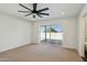 Bright bedroom with sliding door access to backyard at 9626 N 17Th Pl, Phoenix, AZ 85020