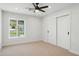 Spacious bedroom with a window and built-in closet at 9626 N 17Th Pl, Phoenix, AZ 85020