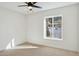 Well-lit bedroom featuring a large window at 9626 N 17Th Pl, Phoenix, AZ 85020