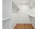 Large walk-in closet with ample shelving and hanging space at 9626 N 17Th Pl, Phoenix, AZ 85020