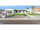 Modern house exterior with landscaped lawn and walkway at 9626 N 17Th Pl, Phoenix, AZ 85020