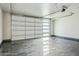 Spacious two-car garage with polished concrete floor and modern door at 9626 N 17Th Pl, Phoenix, AZ 85020