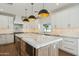 Sleek kitchen with marble countertops and pendant lighting at 9626 N 17Th Pl, Phoenix, AZ 85020