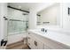 Modern bathroom with a marble shower and floating vanity at 10155 E Topaz Dr, Scottsdale, AZ 85258