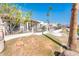 Landscaped yard with mature trees and canal view at 10155 E Topaz Dr, Scottsdale, AZ 85258