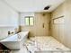Spa-like bathroom with soaking tub and walk-in shower at 10241 N Nicklaus Dr, Fountain Hills, AZ 85268