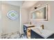 Elegant bathroom with double vanity and stained glass at 10241 N Nicklaus Dr, Fountain Hills, AZ 85268