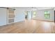 Spacious bedroom with light wood floors and barn door at 10241 N Nicklaus Dr, Fountain Hills, AZ 85268