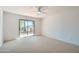 Bedroom with sliding glass door leading to private patio at 10241 N Nicklaus Dr, Fountain Hills, AZ 85268