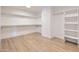 Large walk-in closet with shelving and hanging rods at 10241 N Nicklaus Dr, Fountain Hills, AZ 85268