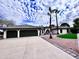 Beautiful home exterior with three-car garage at 10241 N Nicklaus Dr, Fountain Hills, AZ 85268