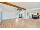 Open living space with hardwood floors, high ceilings, and a view into the kitchen at 10241 N Nicklaus Dr, Fountain Hills, AZ 85268