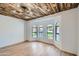 Bright office with hardwood floors and wood-beamed ceiling at 10241 N Nicklaus Dr, Fountain Hills, AZ 85268