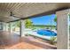 Covered patio overlooking the pool and golf course at 10241 N Nicklaus Dr, Fountain Hills, AZ 85268