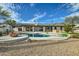 Resort-style backyard with pool and expansive patio at 10241 N Nicklaus Dr, Fountain Hills, AZ 85268
