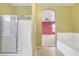 Bathroom with shower and separate tub at 1036 E Oak Rd, San Tan Valley, AZ 85140