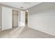 Bedroom with double doors to closet, neutral decor, and carpet at 1036 E Oak Rd, San Tan Valley, AZ 85140