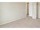 Spacious bedroom with neutral walls and carpet, and a view of hallway at 1036 E Oak Rd, San Tan Valley, AZ 85140