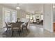 Dining area with a table and chairs, offering views of the backyard at 1036 E Oak Rd, San Tan Valley, AZ 85140