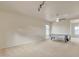 Bright game room featuring a large window, ceiling fan, and air hockey table at 1036 E Oak Rd, San Tan Valley, AZ 85140