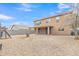 Two-story house with covered patio and desert landscaping at 1036 E Oak Rd, San Tan Valley, AZ 85140