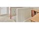 Upstairs hallway with railing and access to upper level at 1036 E Oak Rd, San Tan Valley, AZ 85140
