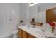 Bathroom boasts double vanity, shower, and decorative accents at 1102 E Bartlett Way, Chandler, AZ 85249
